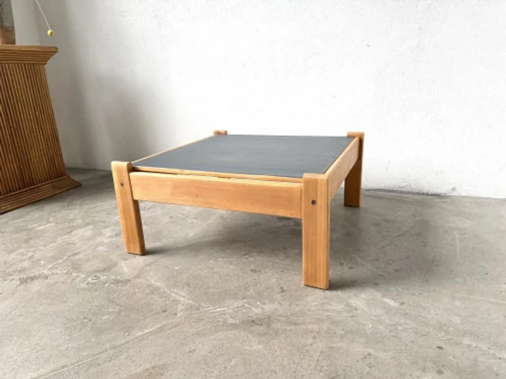 Modernist coffee table in solid pine with a reversible top, 1970s.