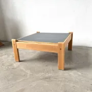 Modernist coffee table in solid pine with a reversible top, 1970s.