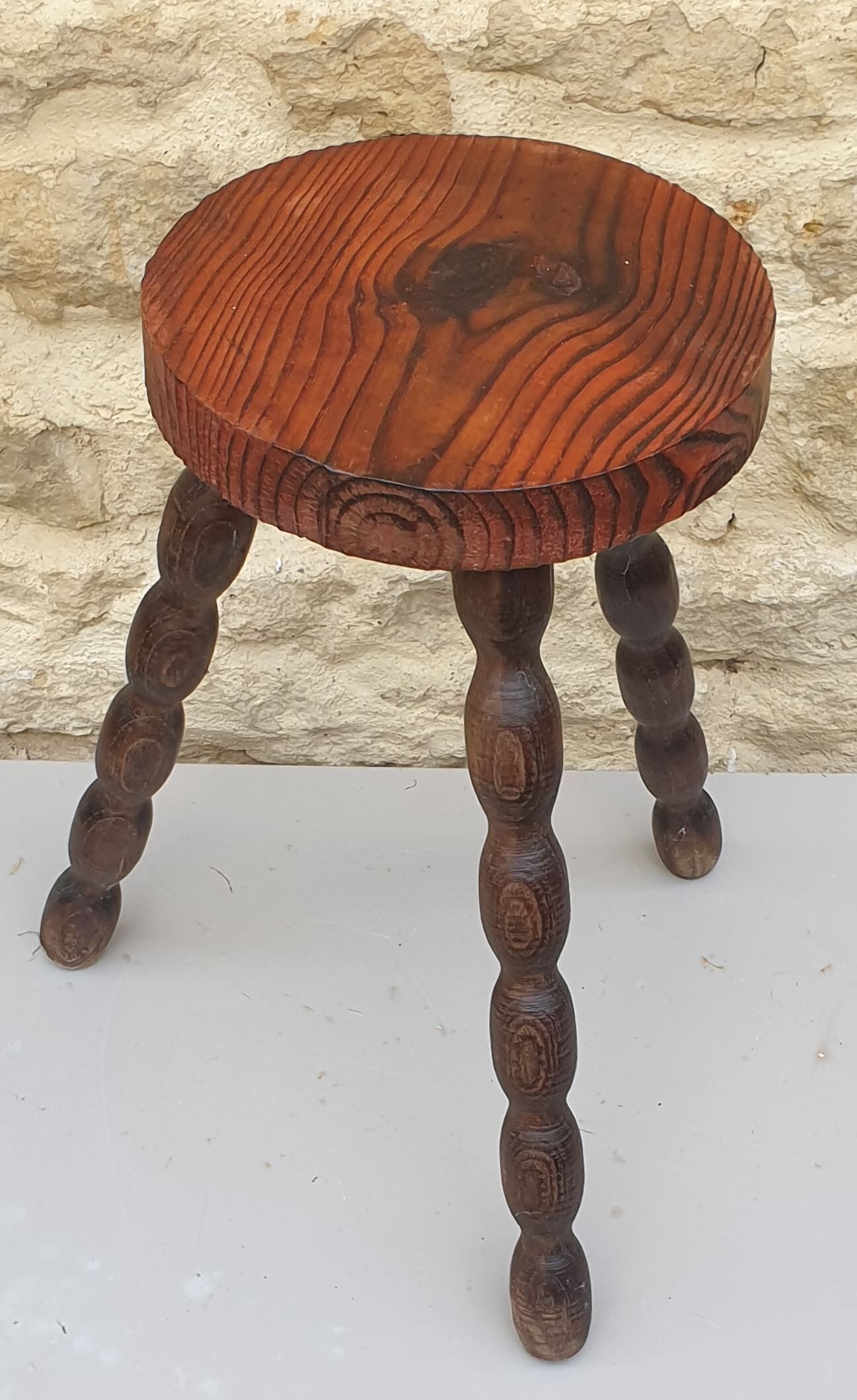 Vintage solid wooden tripod stool