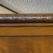 Important architectural fireplace made of solid wood, dating from the 19th century.