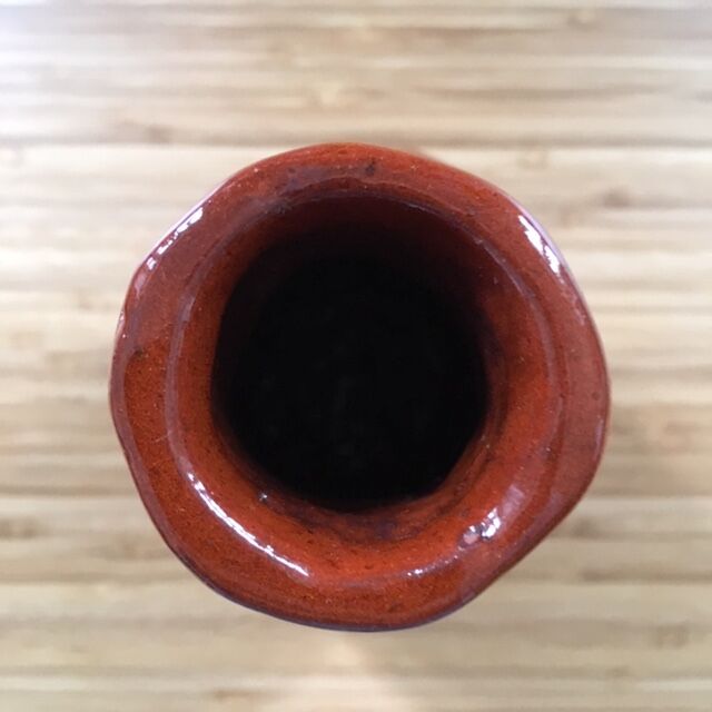 Bottle of chocolate brutalist vase
