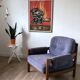 Vintage armchair in wood and blue velvet