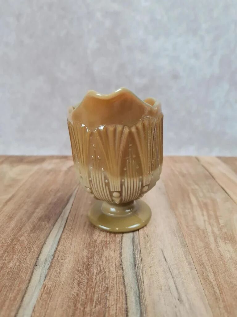 Small antique pressed glass jug in honey colour – moulded decoration