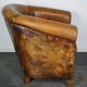 Vintage club armchair in leather color cognac Netherlands
