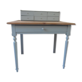 Stepped desk patinated green of gray, wooden top.