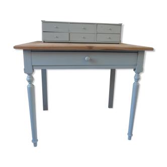 Stepped desk patinated green of gray, wooden top.