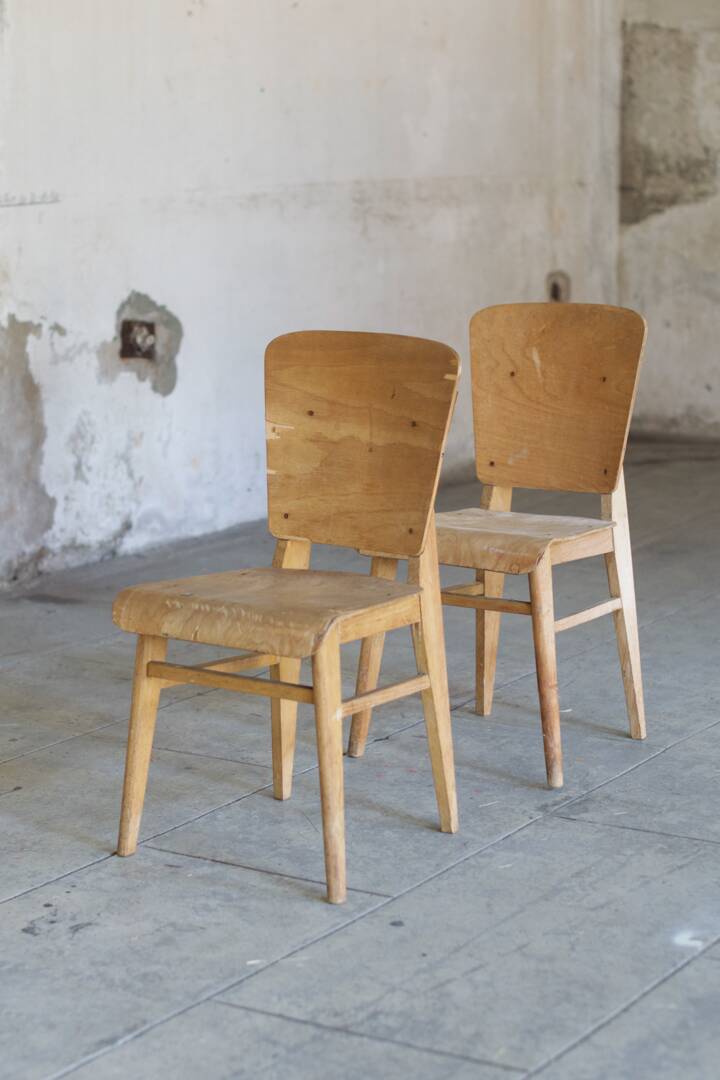 two  style wooden chairs