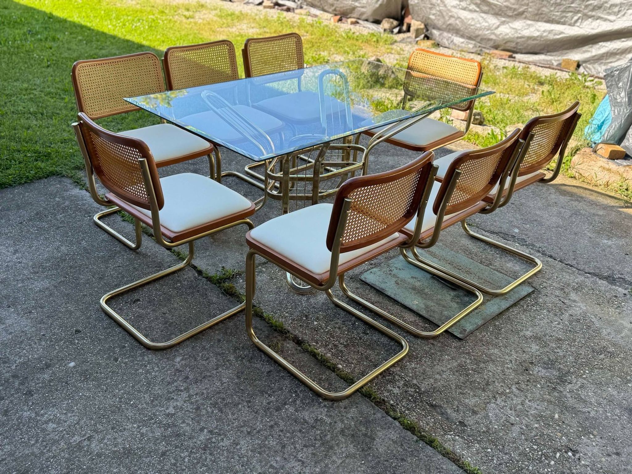 Italian brass dining set with table and chairs, 1970s, set of 9