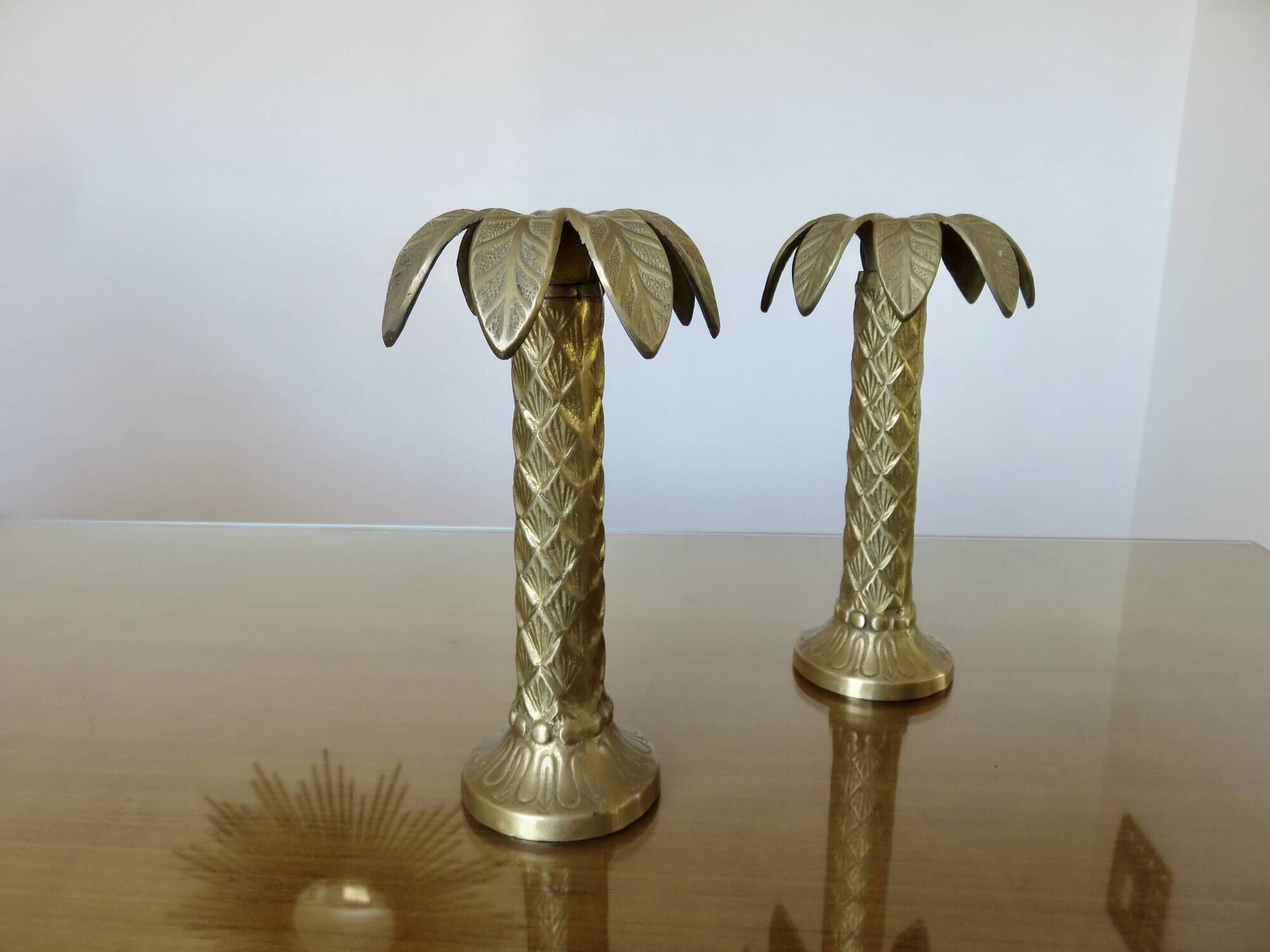 Pair of "palm tree" candlesticks in solid gilded brass, 1970