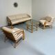 Complete living room with rattan sofa and white bouclette, brass finish, 80's design