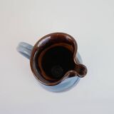 Large blue pitcher with abstract pattern