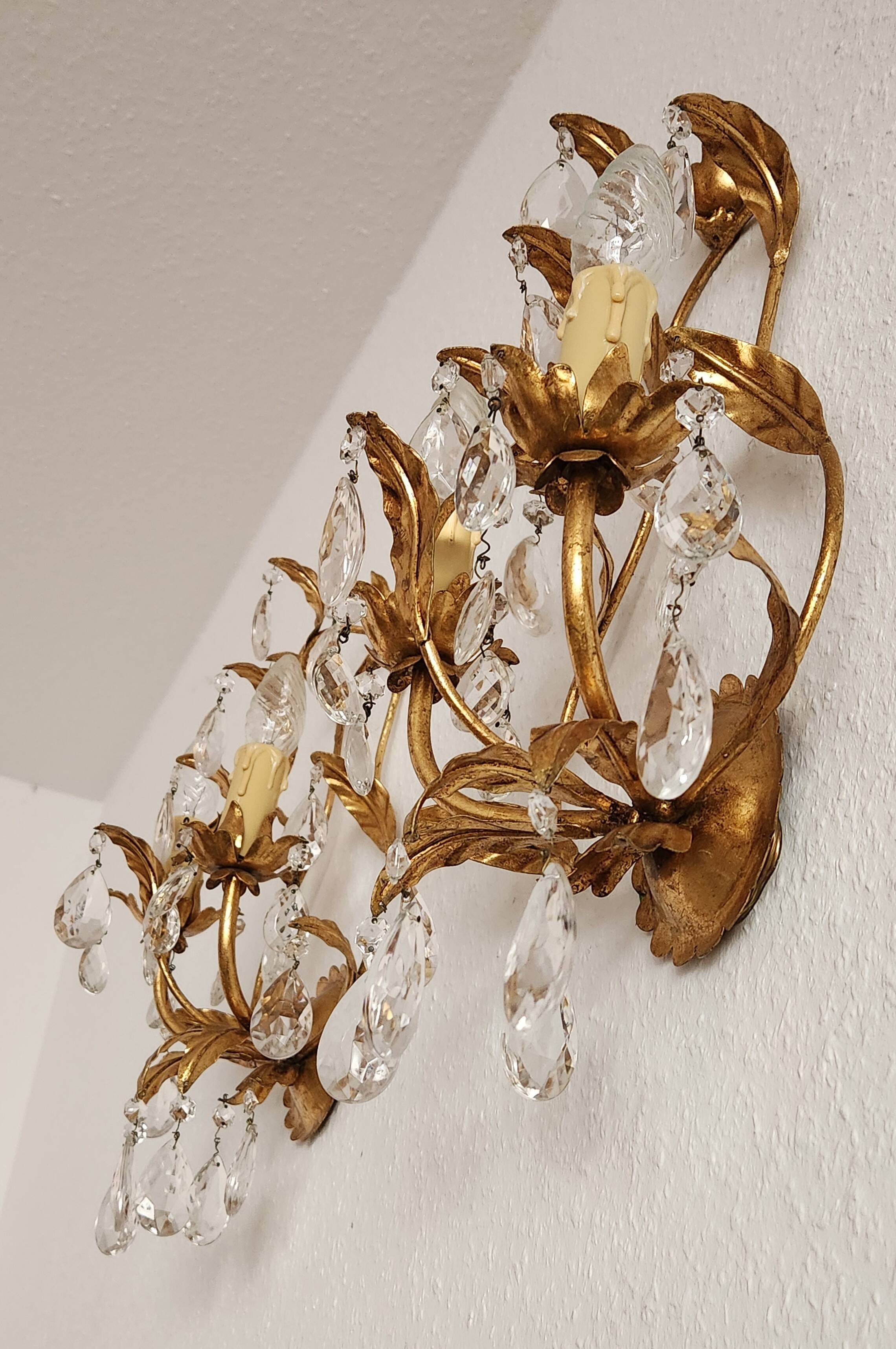 Hand-forged wall lamp gilded with gold leaf and crystals, Italy