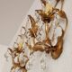 Hand-forged wall lamp gilded with gold leaf and crystals, Italy