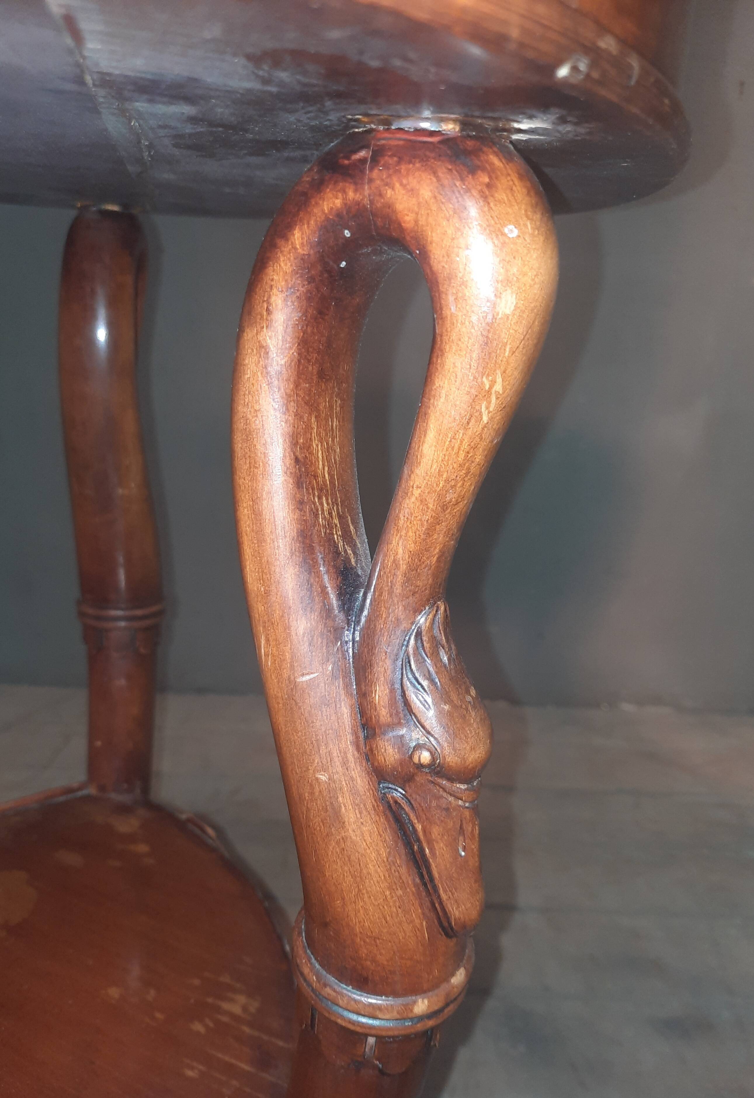 Side table with a swan neck.