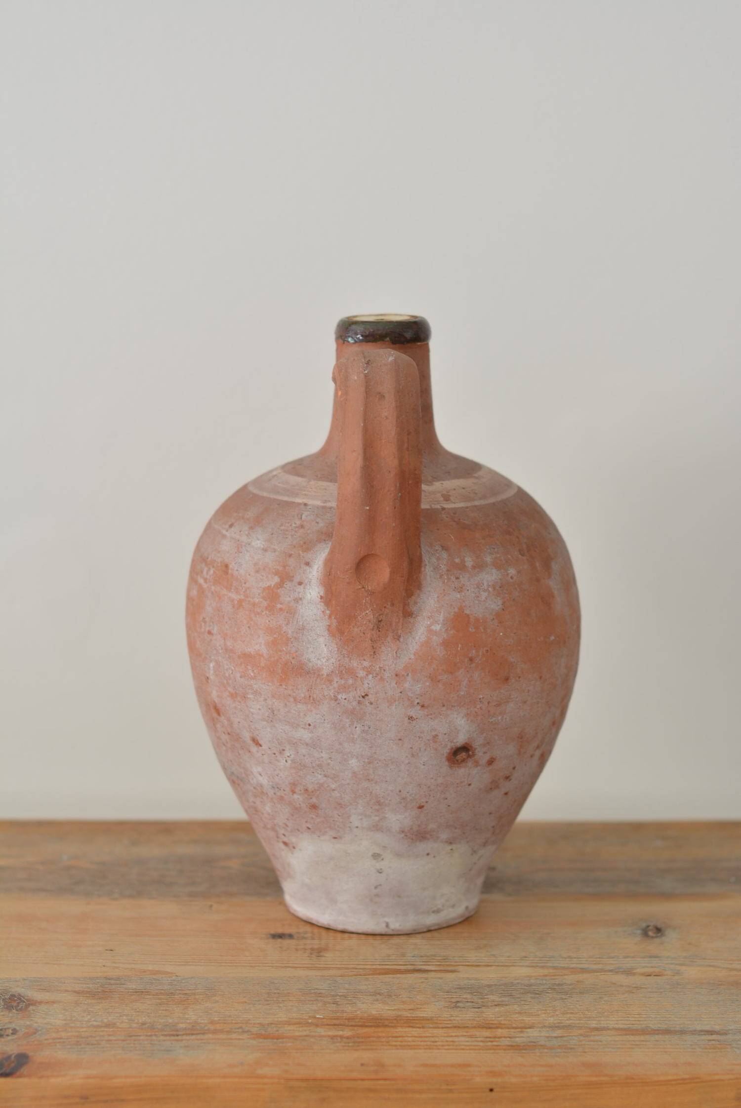 Ancient jug, terracotta pitcher from the Mediterranean.