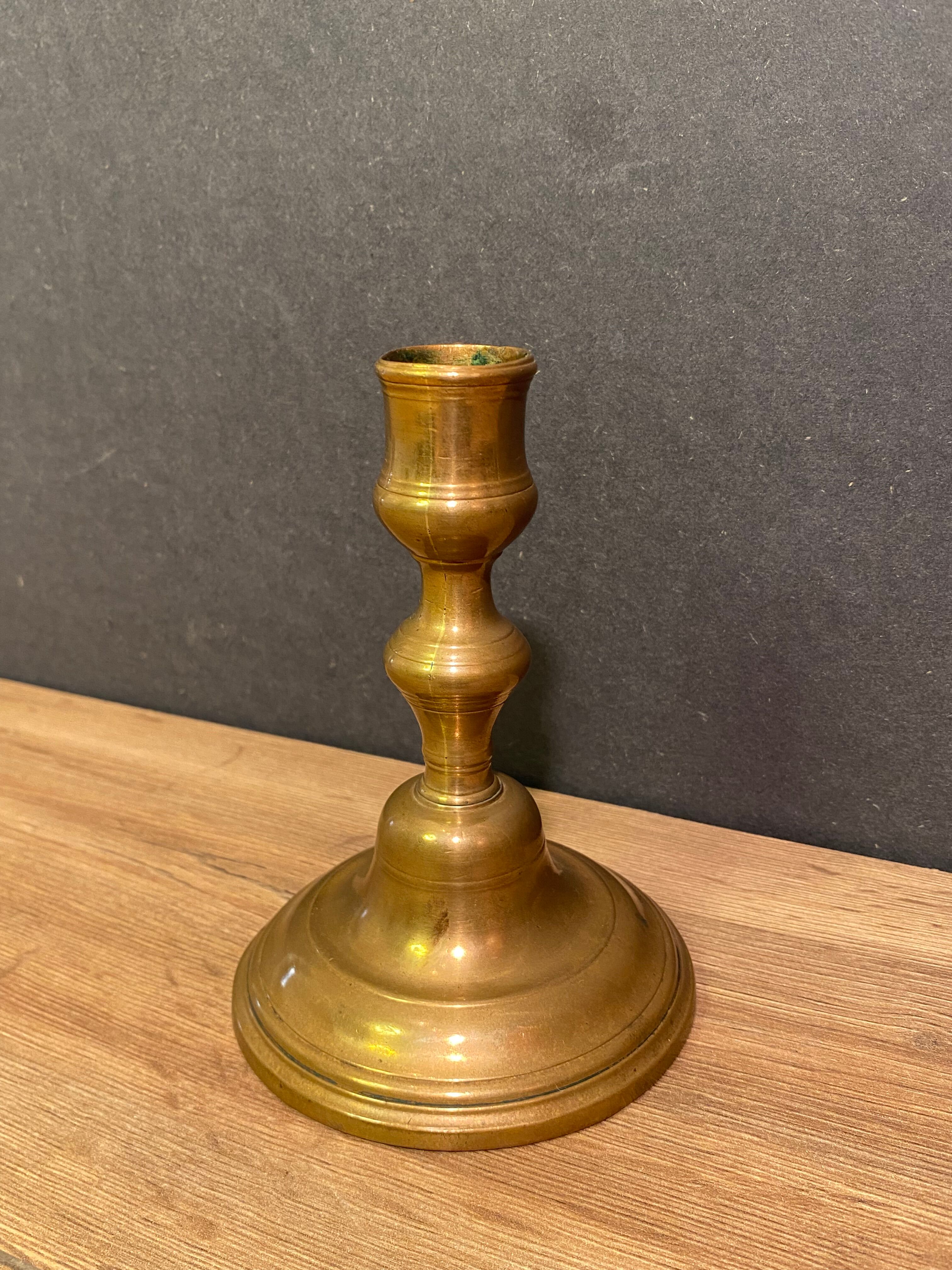 Eighteenth-century brass bronze candle holder