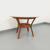 Vintage round smoked glass and rattan coffee table from the 70s
