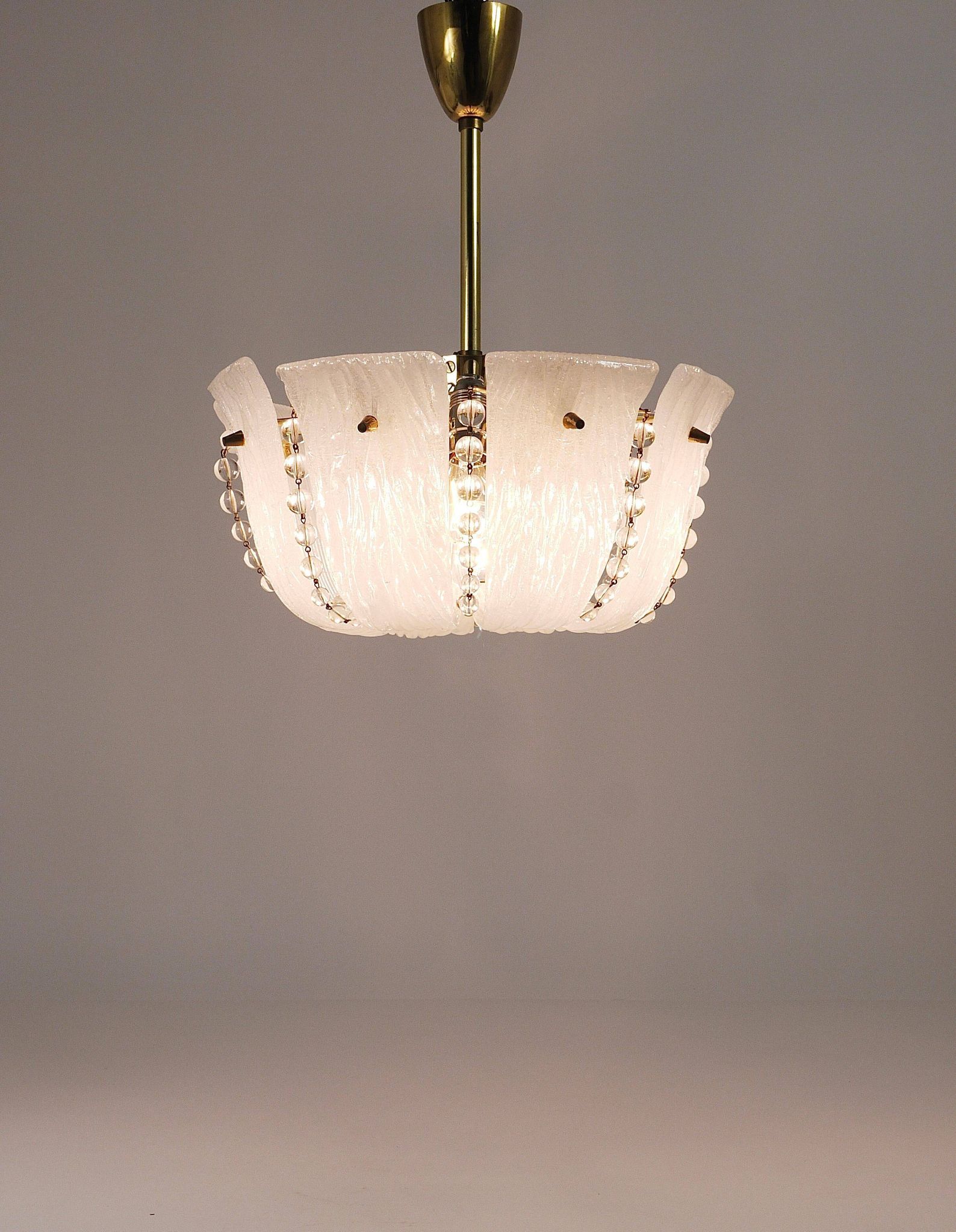 J.T. Kalmar Petite curved suspension basket, brass and glass, Austria, 1950s