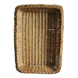 A large vintage rectangular wicker basket