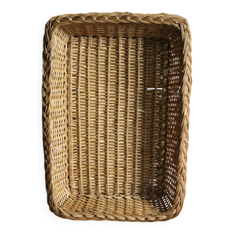 A large vintage rectangular wicker basket