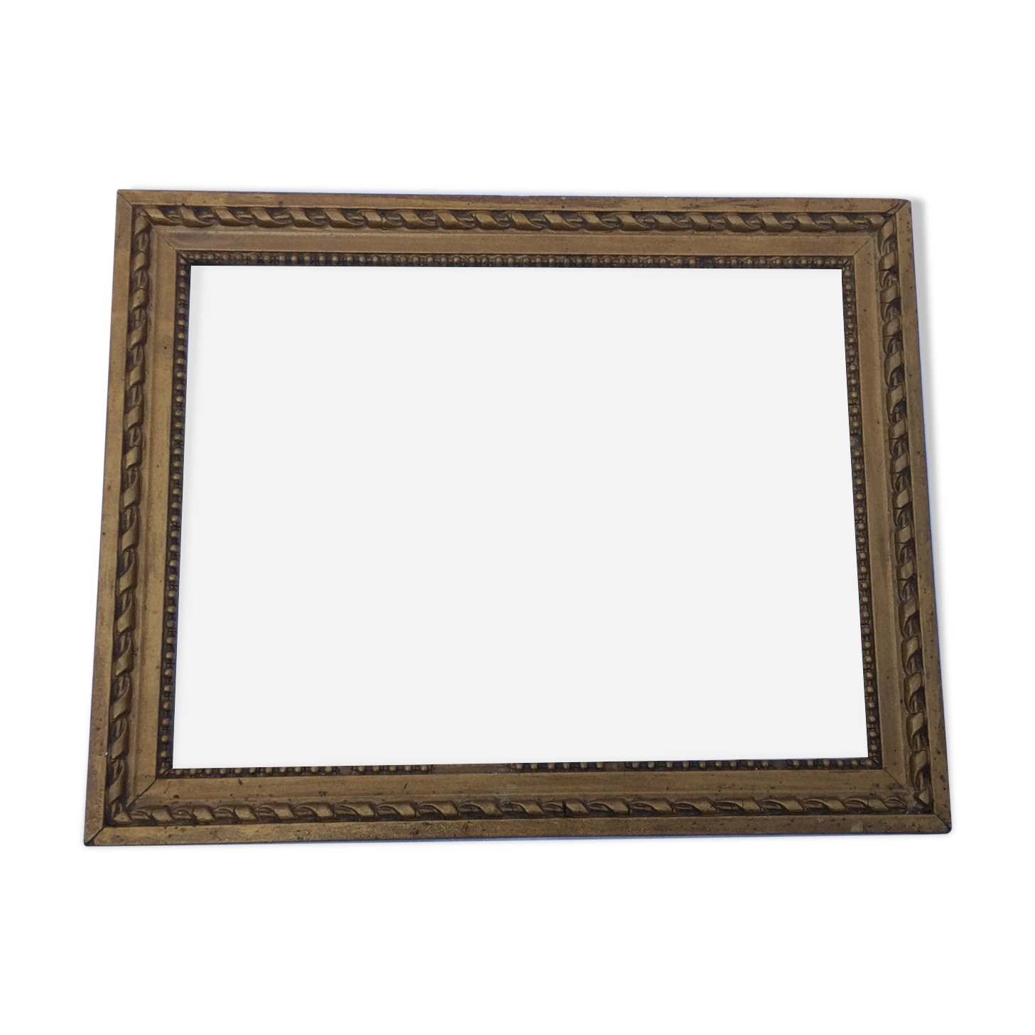 Gilded wooden frame and its glass