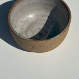 Small brown bowl inside blue and white