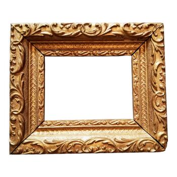 Golden frame in the Bérain Louis XIV style