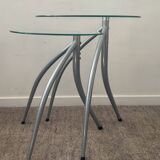 Duo of designer nesting tables with tripod base