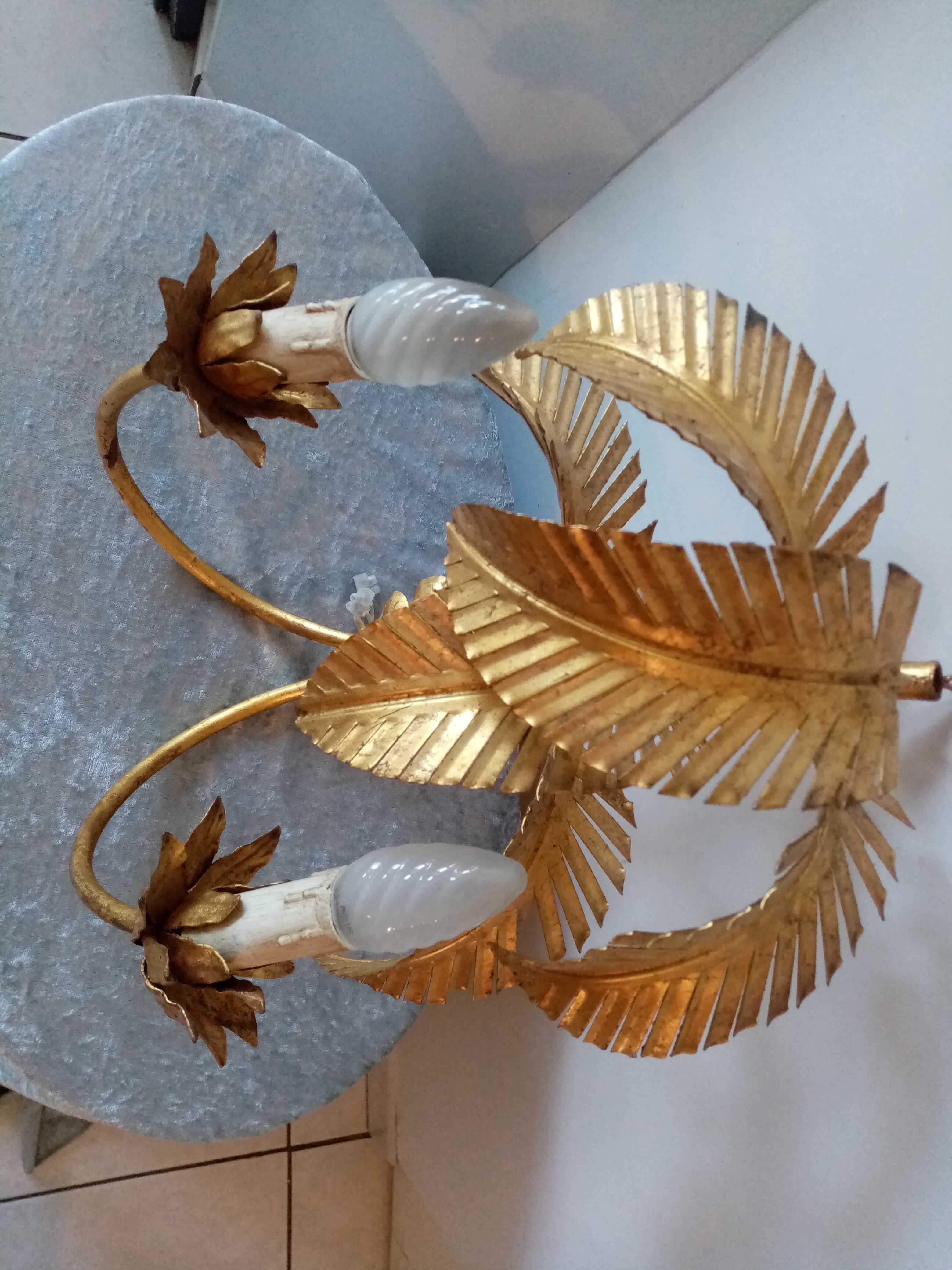 Old wall lamp palm shaped metal dore with leaf