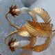 Old wall lamp palm shaped metal dore with leaf