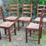 Suite of 17 straw chairs with high backs