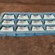 Set of 12 porcelain knife rests