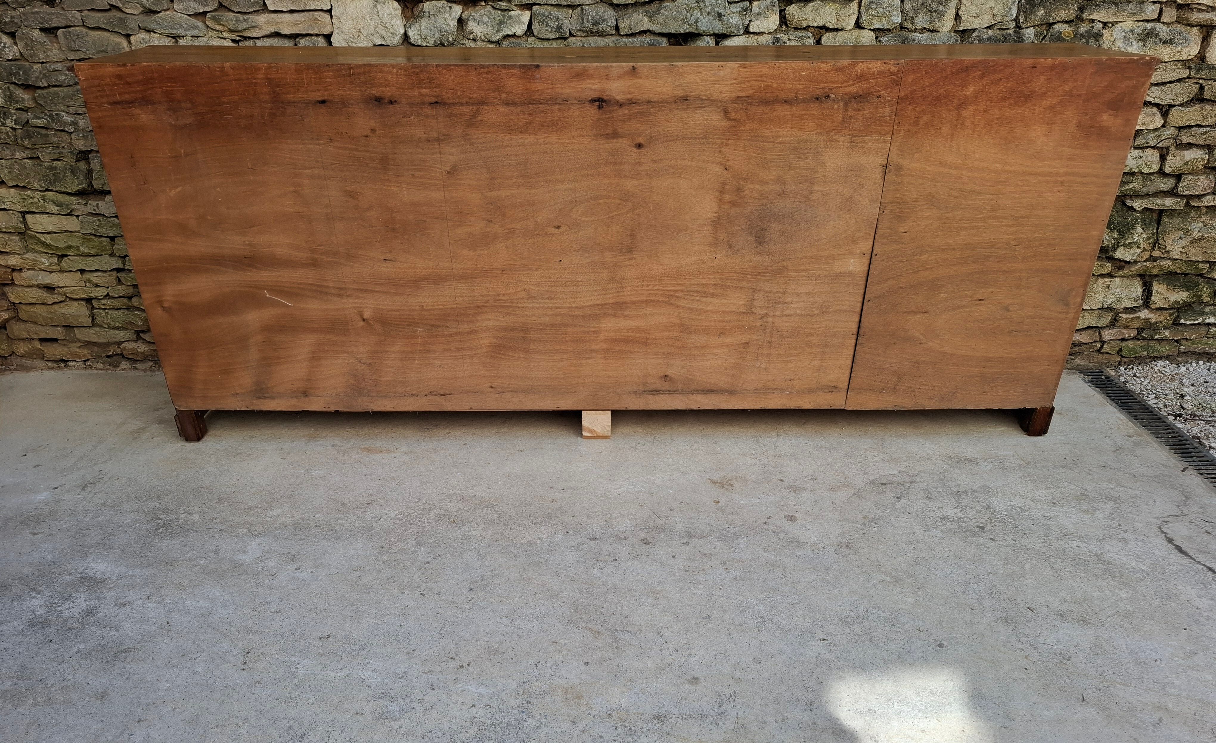 Oak workshop furniture with sliding doors.