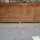 Oak workshop furniture with sliding doors.