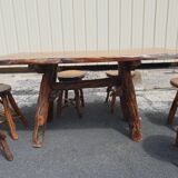 Table and 6 brutalist stools 1970