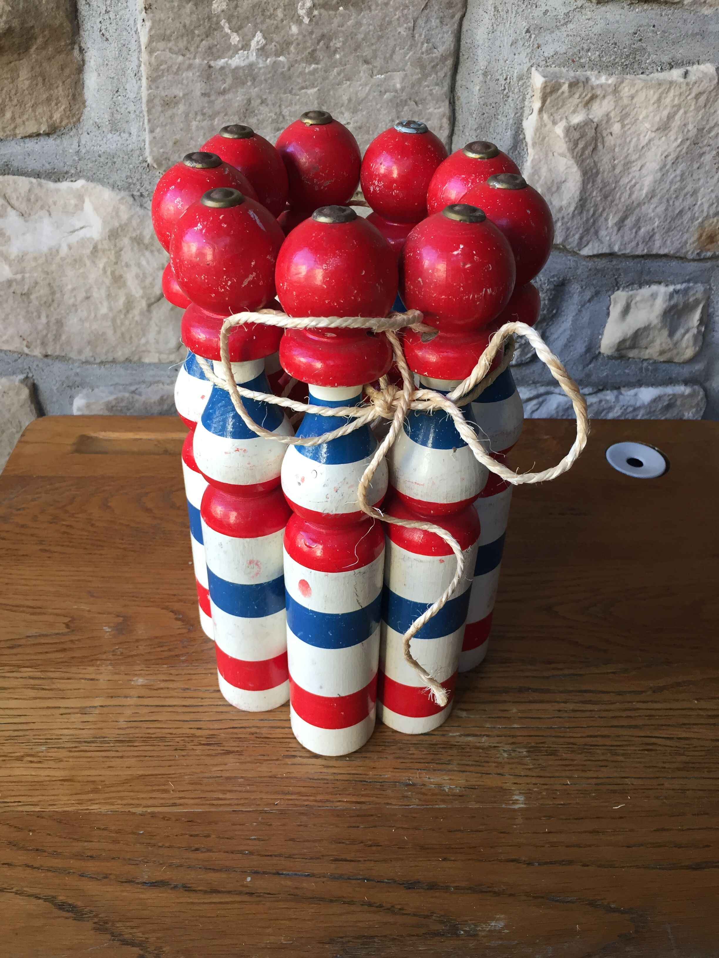 Old vintage wooden bowling game triclore plus two balls