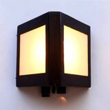 Double-sided patinated triangular wall light