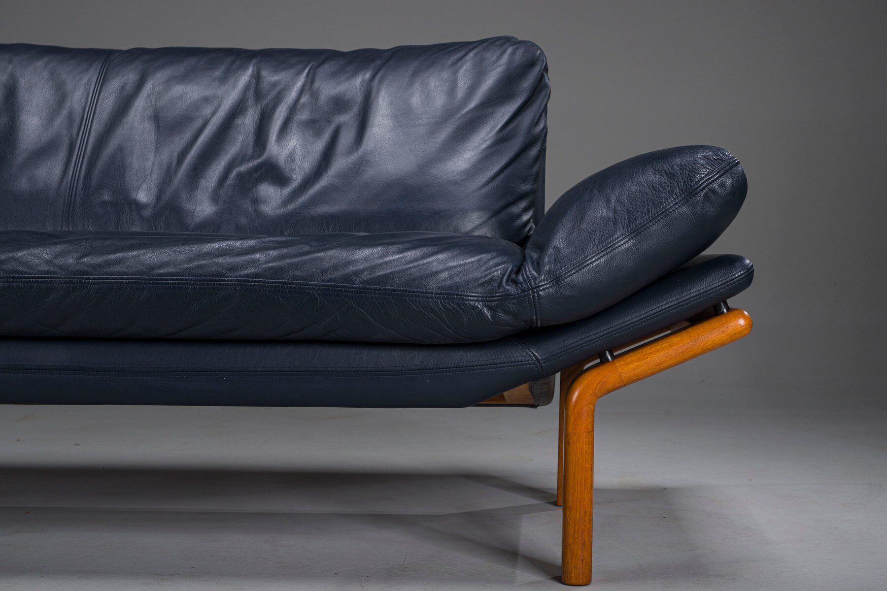 Danish teak and navy blue leather 3-seater sofa from Komfort, 1970s