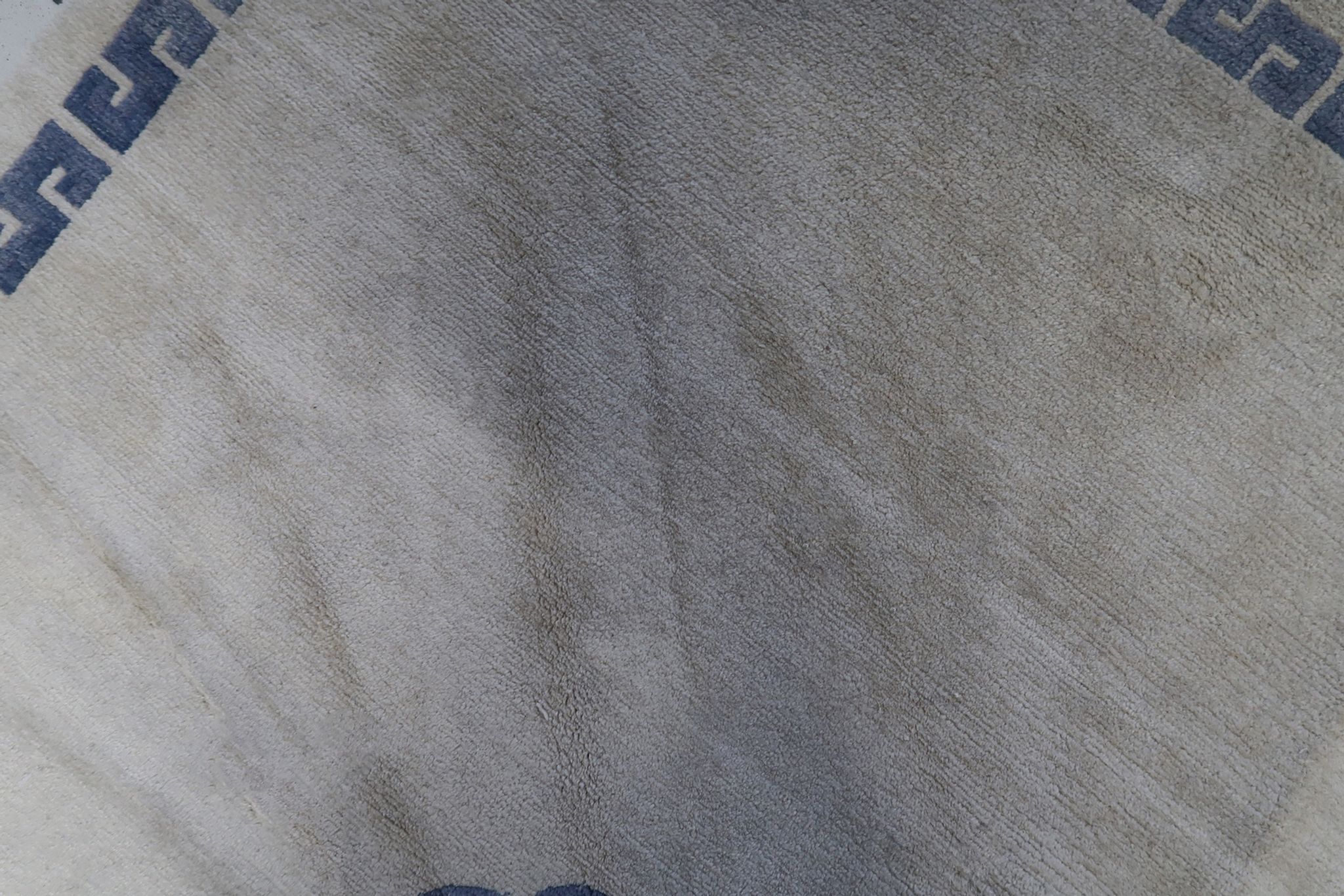 Vintage handmade 4.8' x 6.1' (147 cm x 187 cm) Tibetan Khaden rug from the 1970s