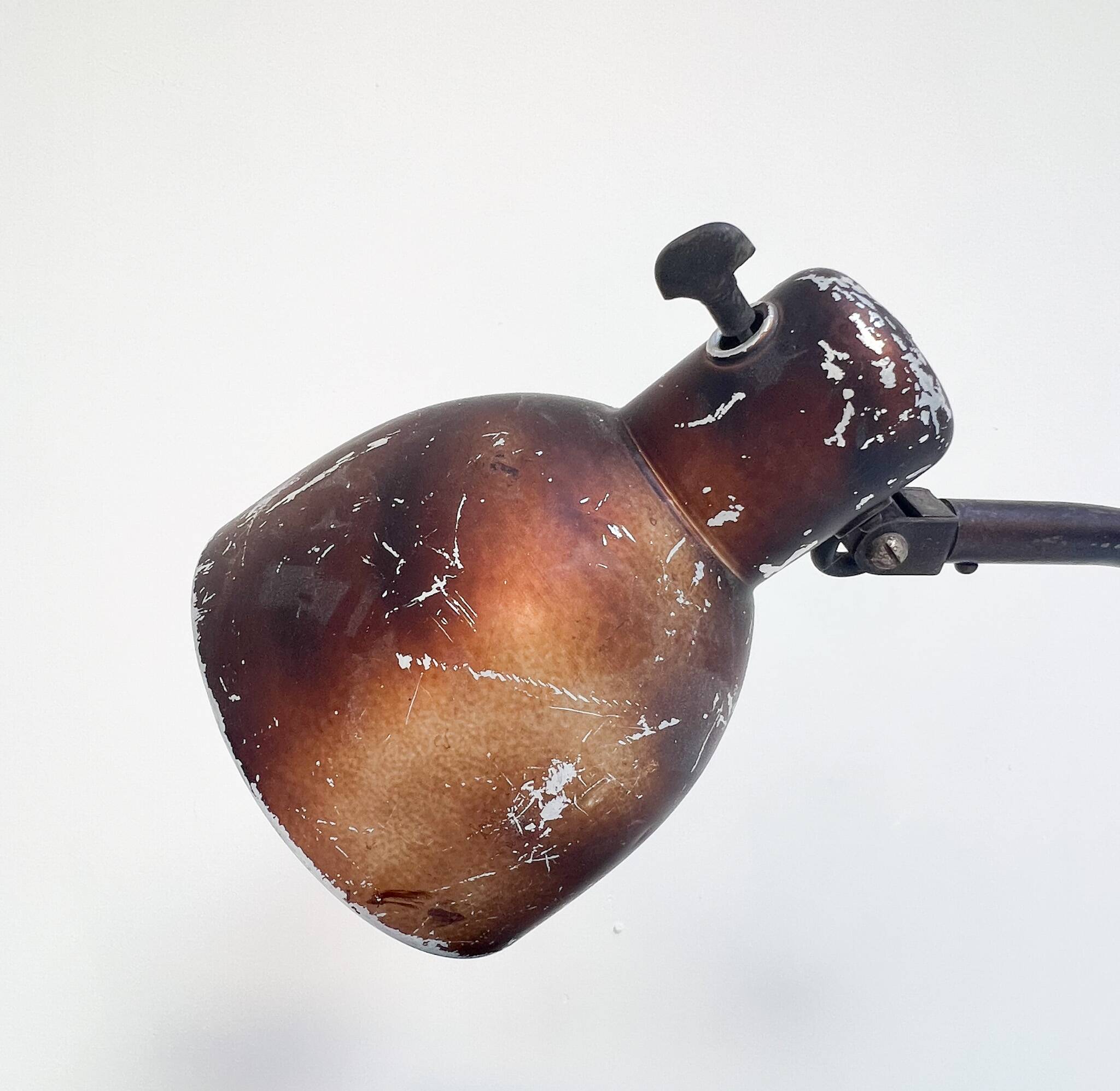 Industrial in height to be adjusted vintage clamp lamp from the 1970s