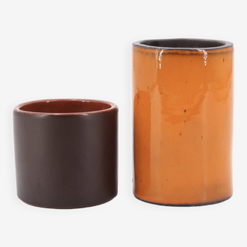 Orange and brown ceramic scroll vases