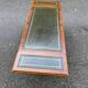 Victorian extendable coffee table in solid mahogany wood and green leather