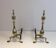 Pair of neo-Gothic bronze and wrought iron andirons