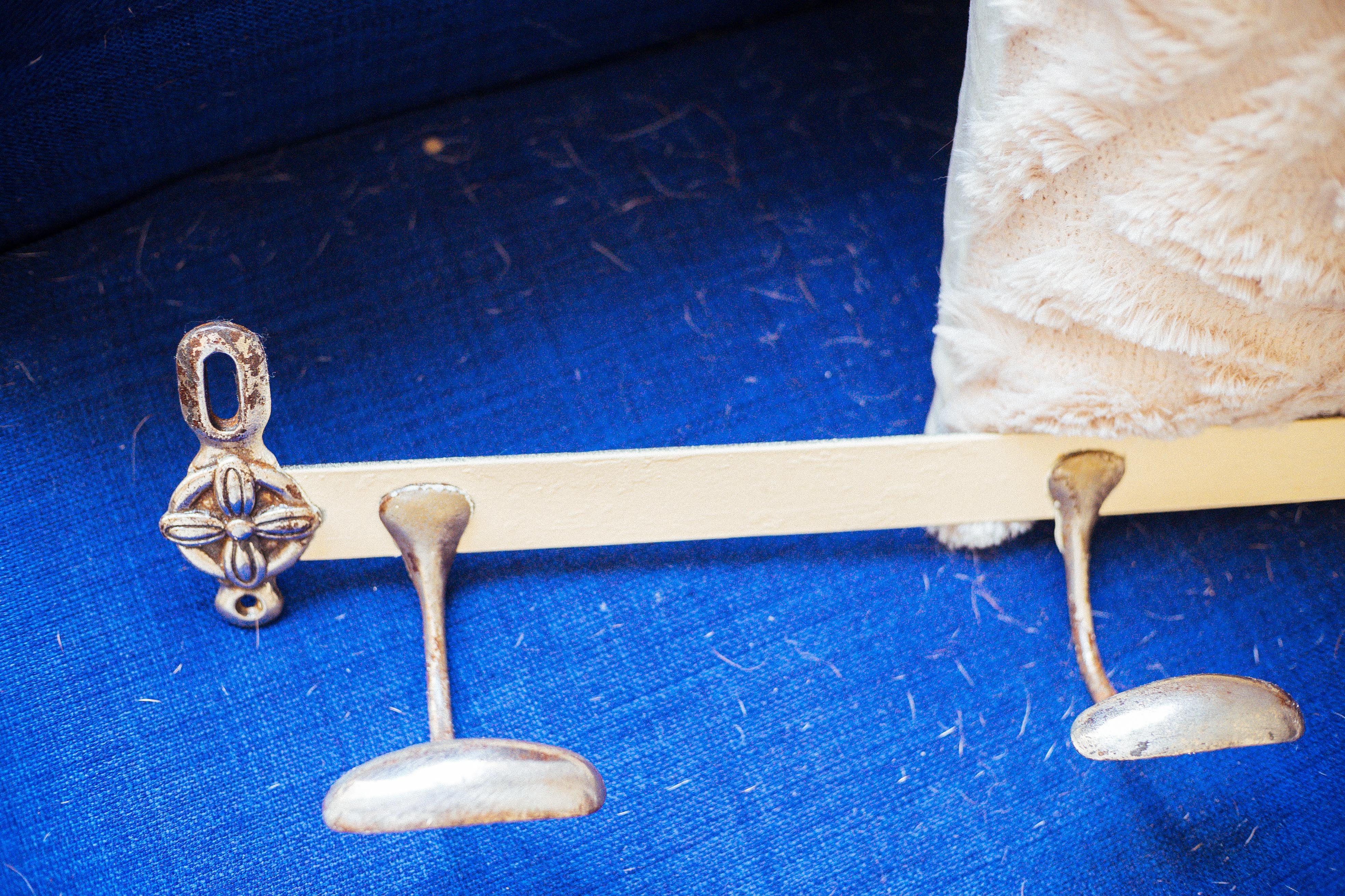 Antique wrought iron coat rack