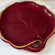 Mid-Century catchall in ruby red ceramic with gold trim – shape