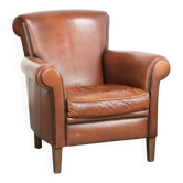 Comfortable sheepskin armchair with a sleek finish