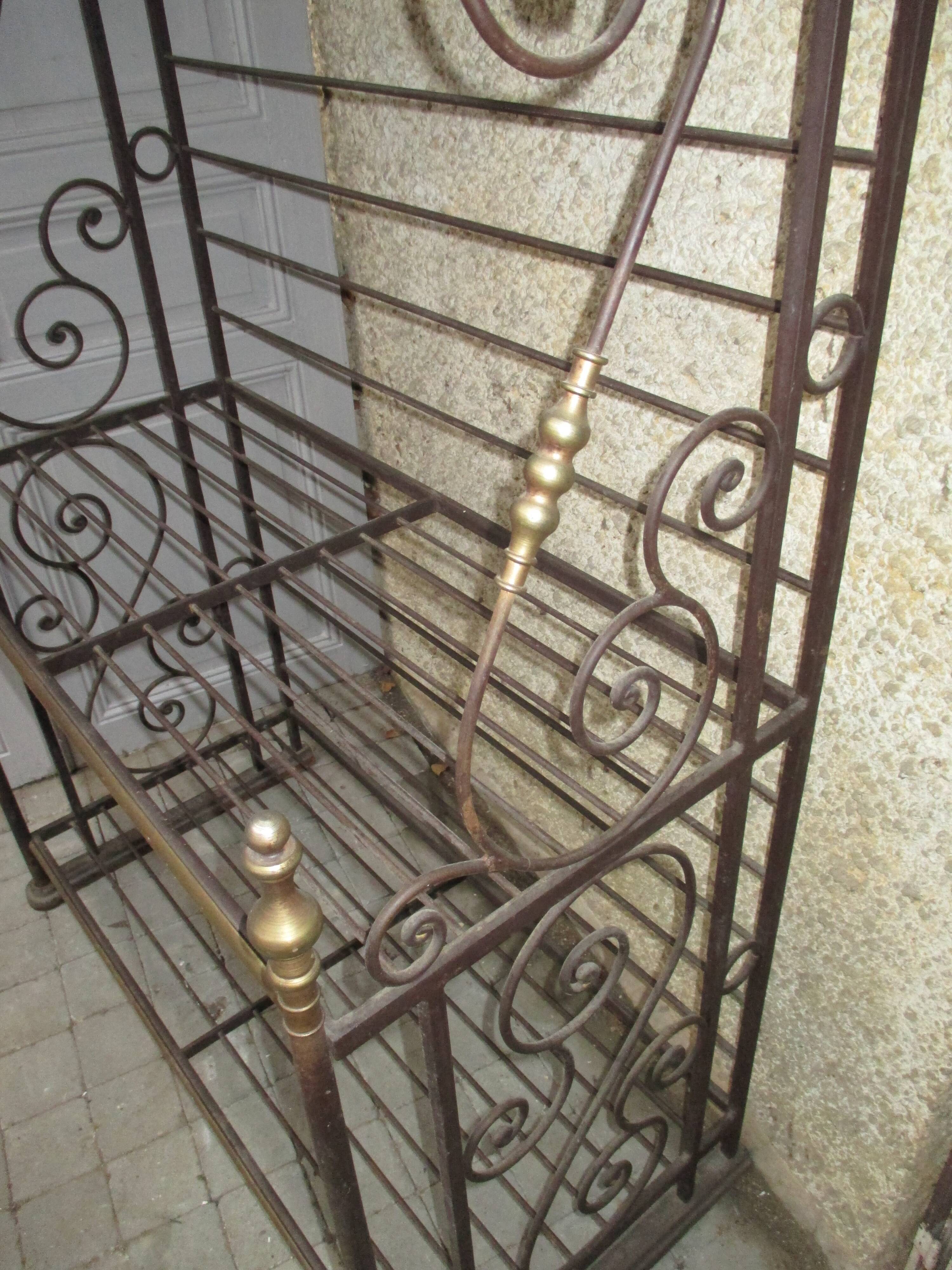 Baker metal and brass shelf