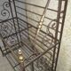 Baker metal and brass shelf