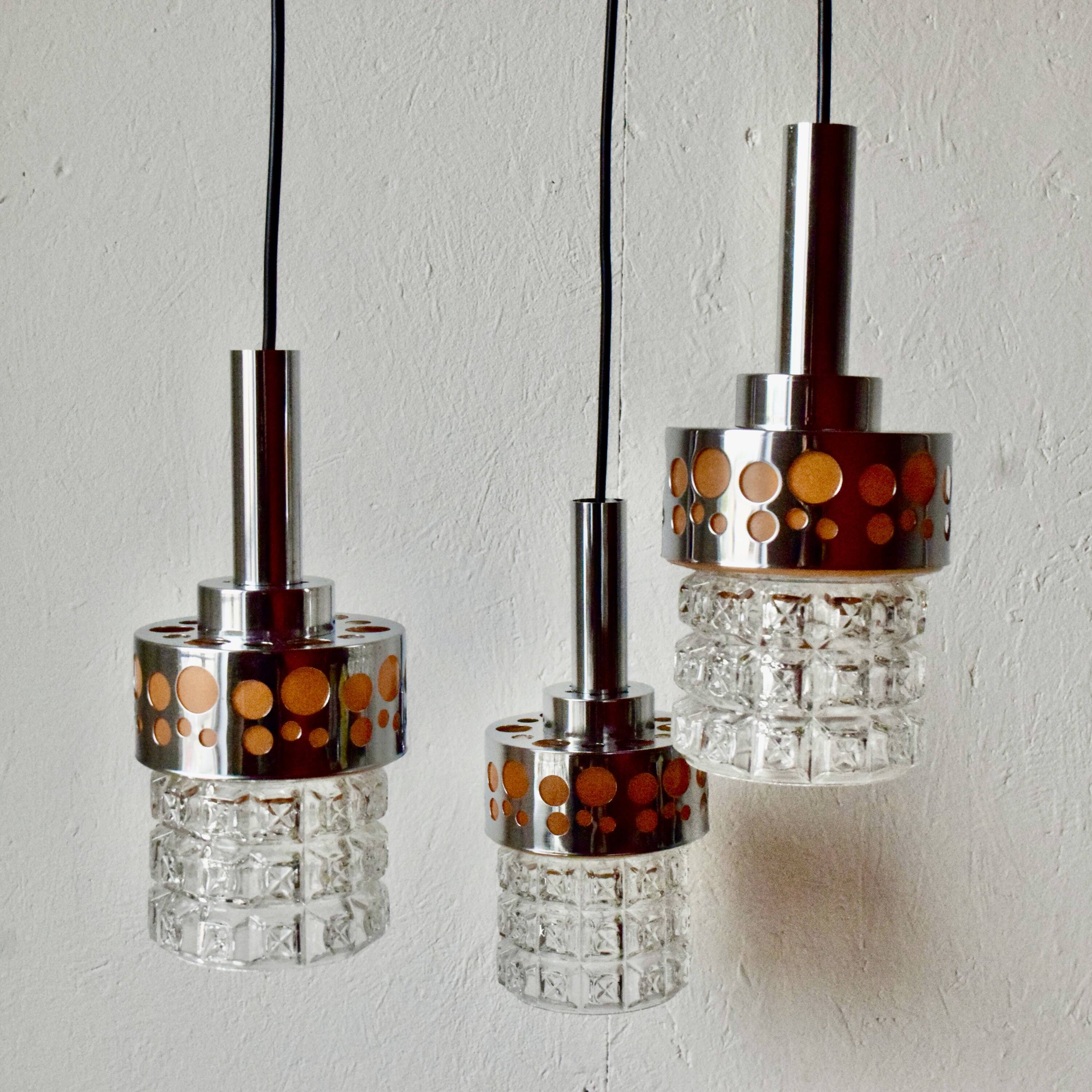 Triple vintage pendant light in molded glass, chrome metal and orange plastic - Space Age Design