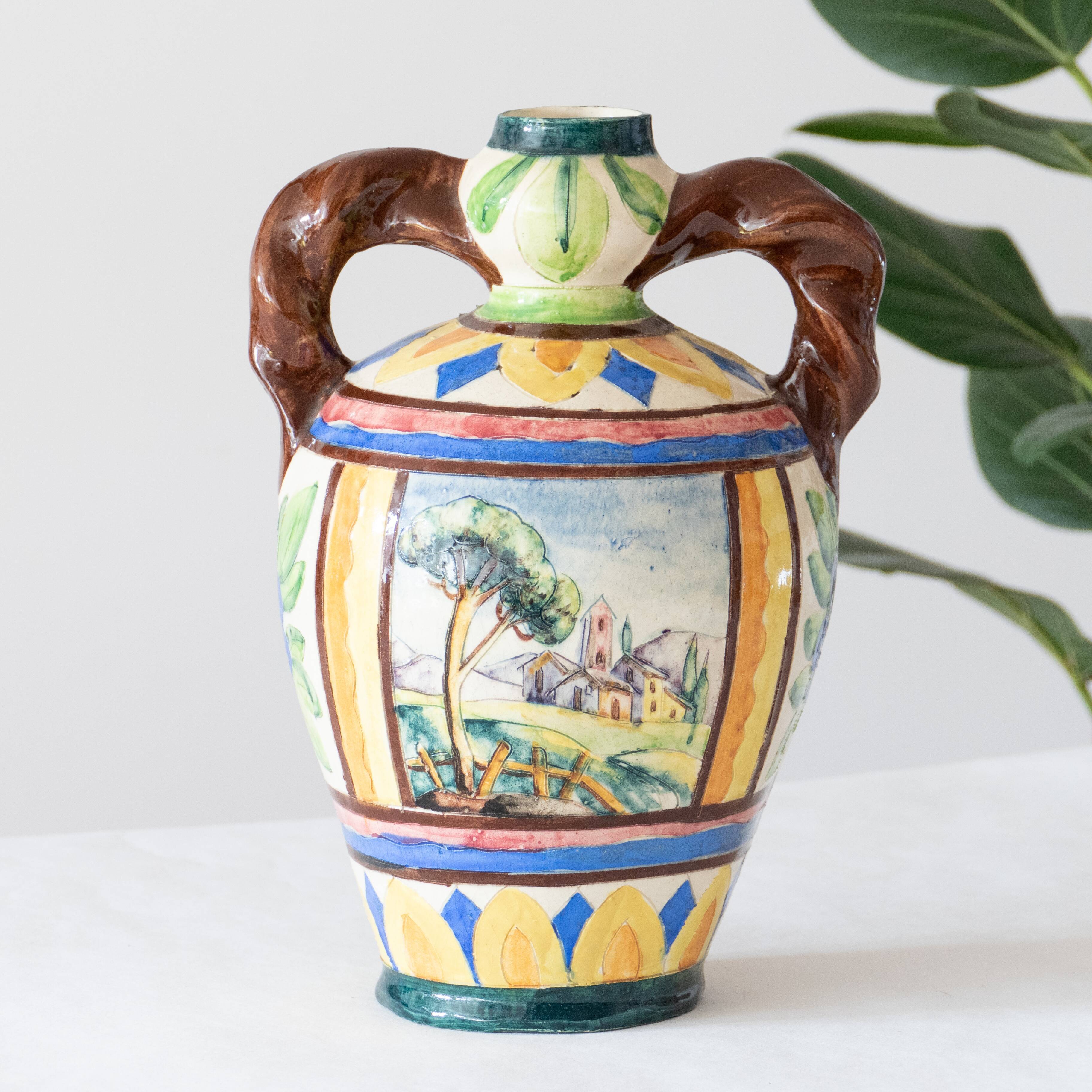 Old handcrafted amphora / polychrome bird glazed terracotta vase